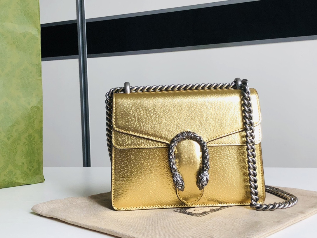 G*u*i dionysus bag